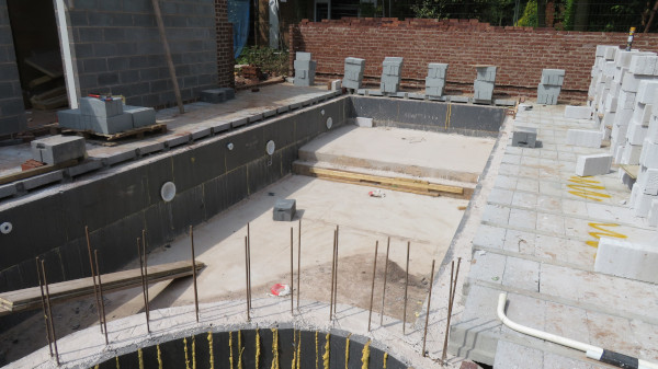 Polyblok Pool Walls With Through the Wall Equipment and full width steps