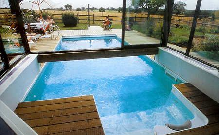 pool half indoor and half outdoor with spa seating