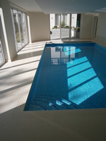 detached indoor spa with hydraulic cover but unsuitable dosing system to keep the pool safe