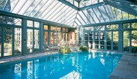 large pool with conservatory type fixed timber enclosure