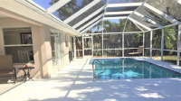 Pool with large conservatory type enclosure
