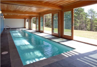 Narrow lap pool with large glazed panels