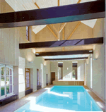 10 x 4 indoor pool with large blck cross beams and high bay windows