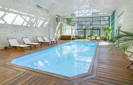 pool in a renovated barn with fully glazed gable