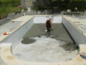 outdoor inground pool built in site of restricted size