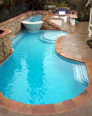 interesting outdoor pool and hydrotherapy pool with bowl shaped end