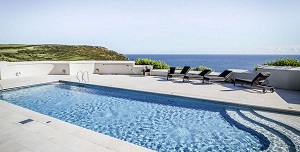 Beautiful outdoor rectangle pool with curved steps