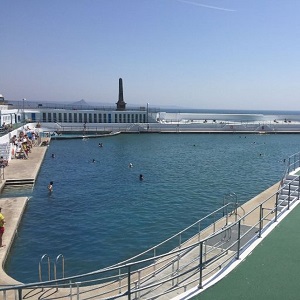 Large outdoor sea water pool with paddling pool area