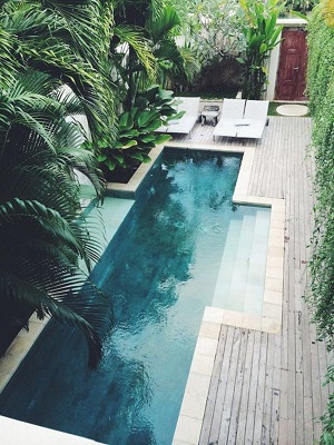 Narrow tropical pool with large steps