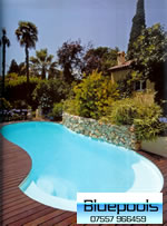 9.5 x 4 metre fibreglass pool in landscaped garden