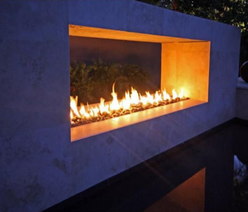 outdoor pool with fire trough feature