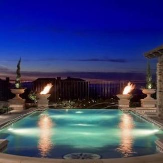 fire bowls near outdoor pool